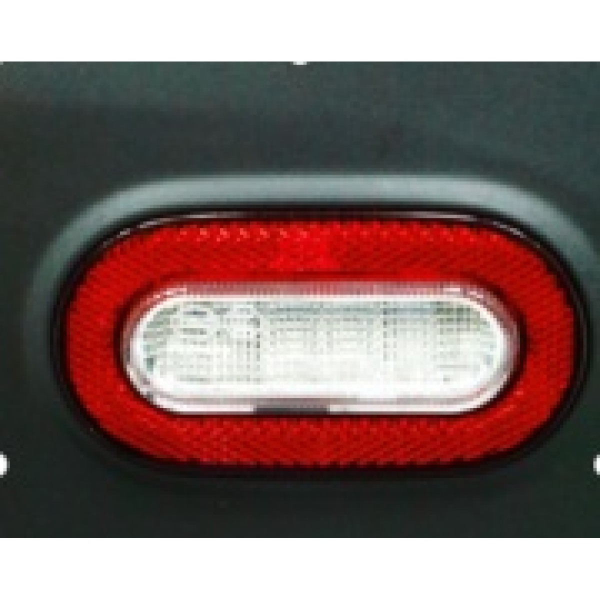 Reverse lights with return reflector assembly