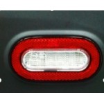 Reverse lights with return reflector assembly